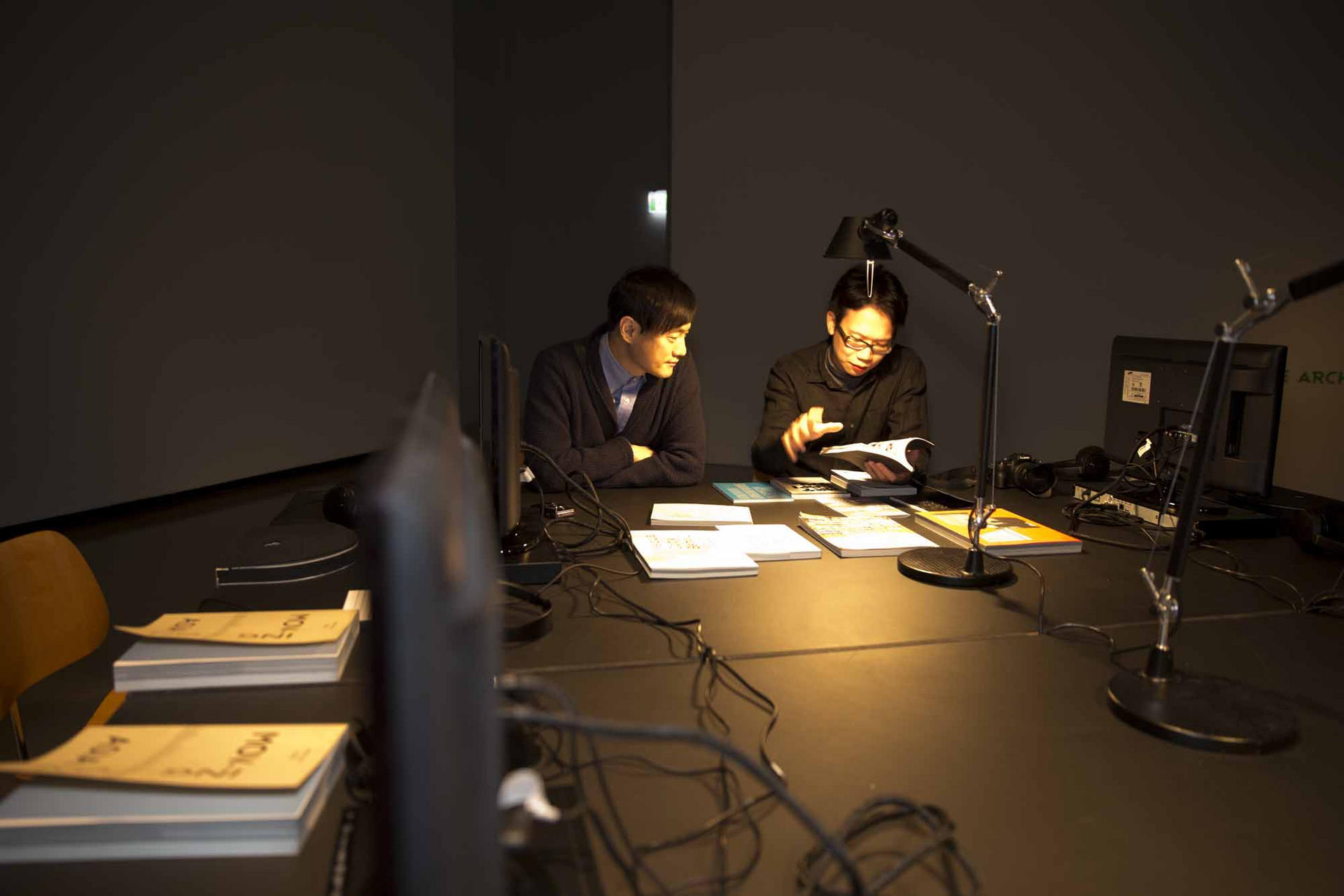 Artist Tsui Kuang-yu and Suh Jin-suk, director of Gallery Loop in Seoul, work on the "Moving on Asia" travelling exhibition (left), which is showing at Wellington's City Gallery. Photo: Justine Hall