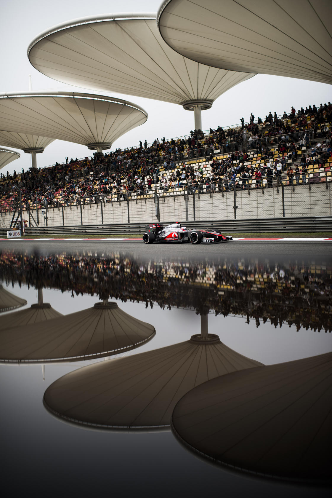 Britain's Jenson Button racing in his MP-27 car during the UBS Chinese F1 Grand Prix at Shanghai, 2012. Photo: Victor Fraile/Corbis