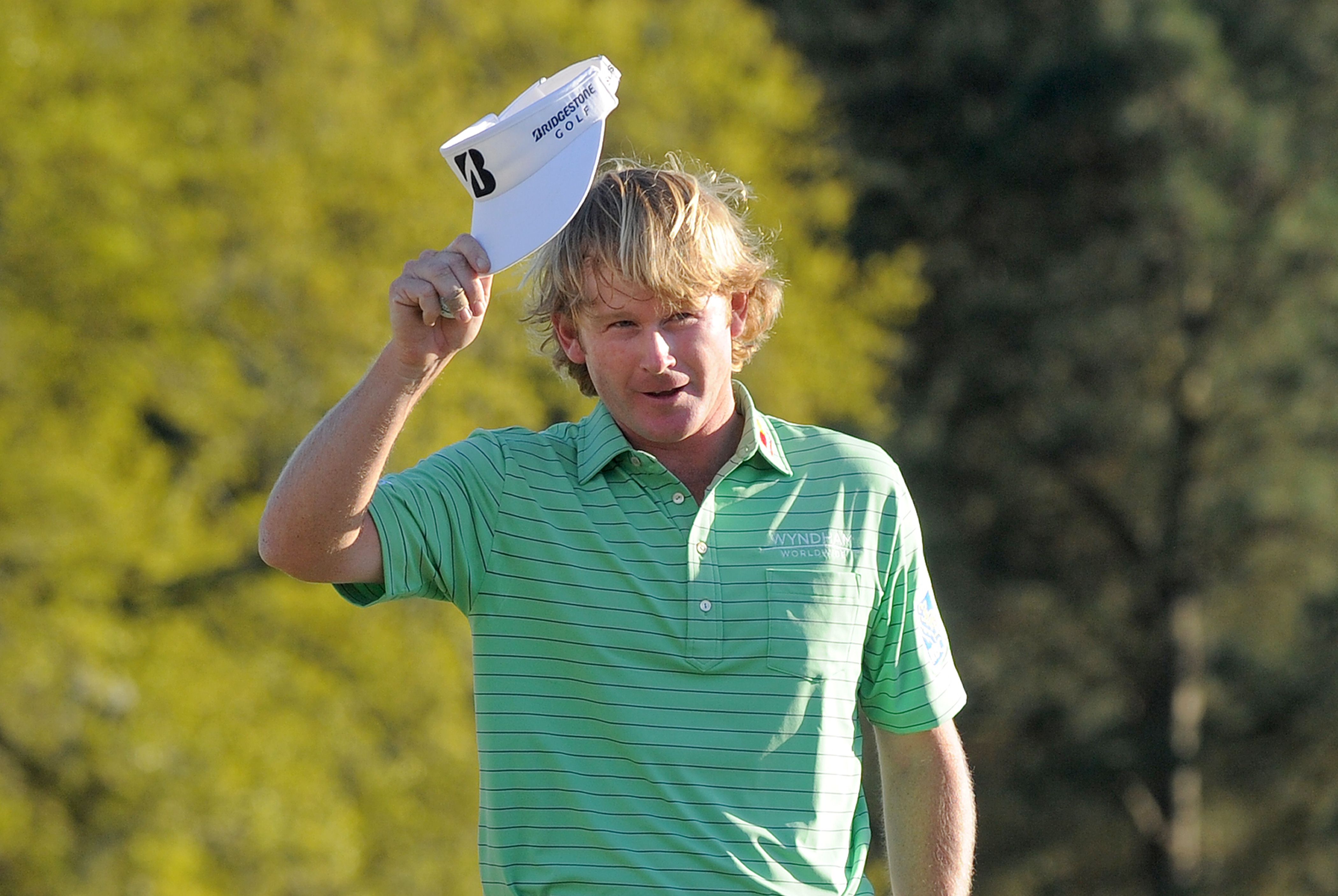 Brandt Snedeker of the US waves to the crowd on the 18th green during the third round of the 77th Masters golf tournament on Saturday at Augusta National Golf Club. Photo: AFP 