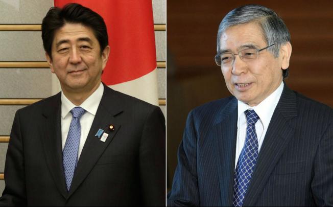 Shinzo Abe and Haruhiko Kuroda. Photo: AFP, EPA