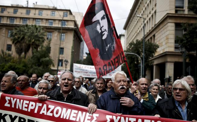 Pensioners march in an anti-austerity rally in Athens, Greece. Photo: Reuters