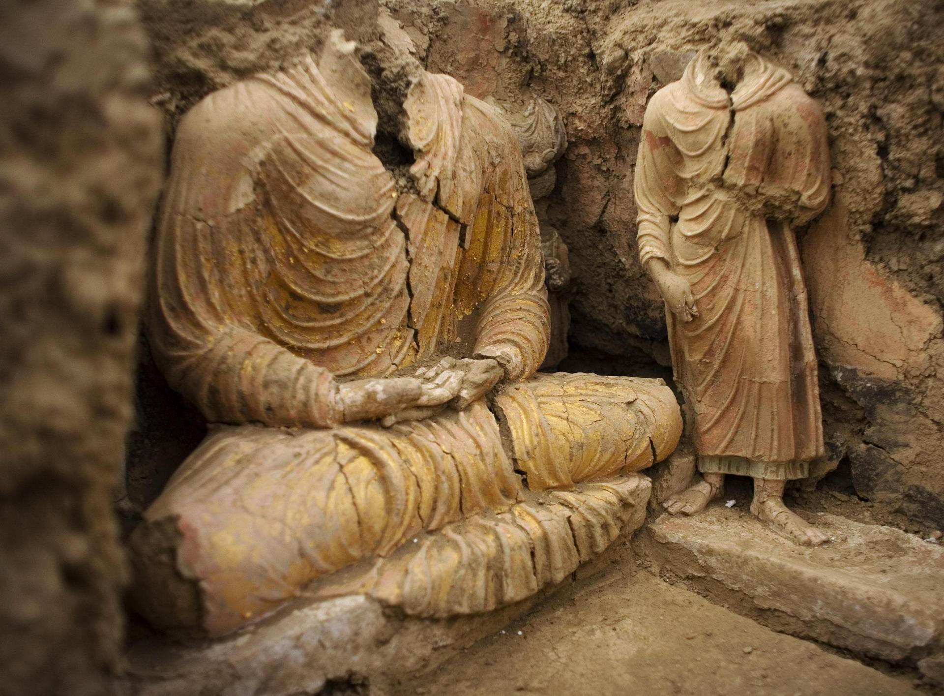 Remains of Buddha statues inside an ancient temple in Mes Aynak, Afghanistan. Photos: AP; AFP; FlickrVision; Andy Miller