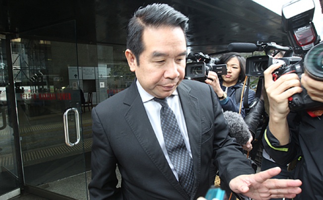 Birmingham City owner Carson Yeung leaves the District Court in Wan Chai yesterday. Photo: David Wong