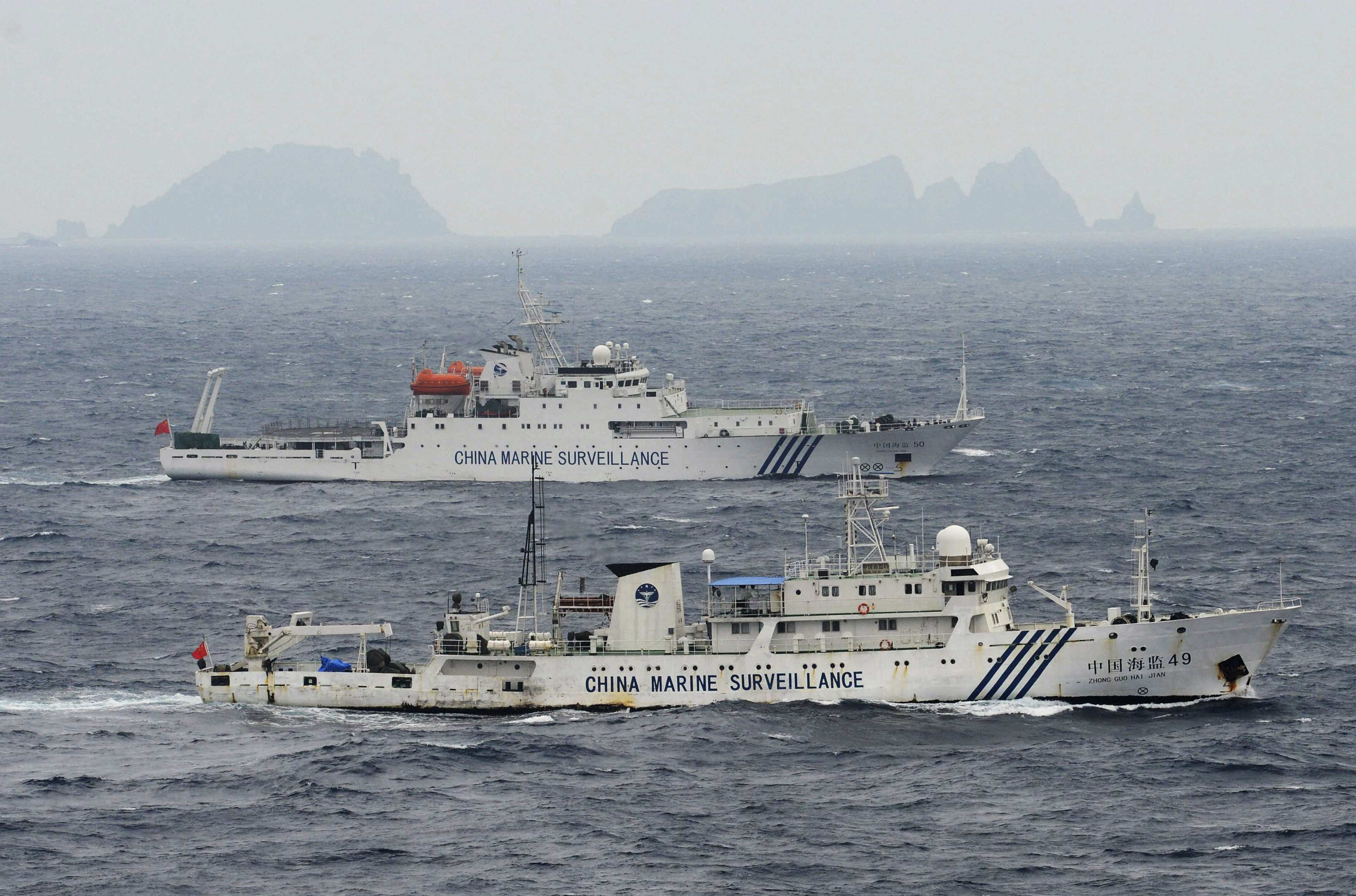Chinese marine surveillance ships cruising in the East China Sea near the disputed Diaoyu Islands, also known as the Senkaku isles in Japan, on April 23, 2013. Photo: Reuters