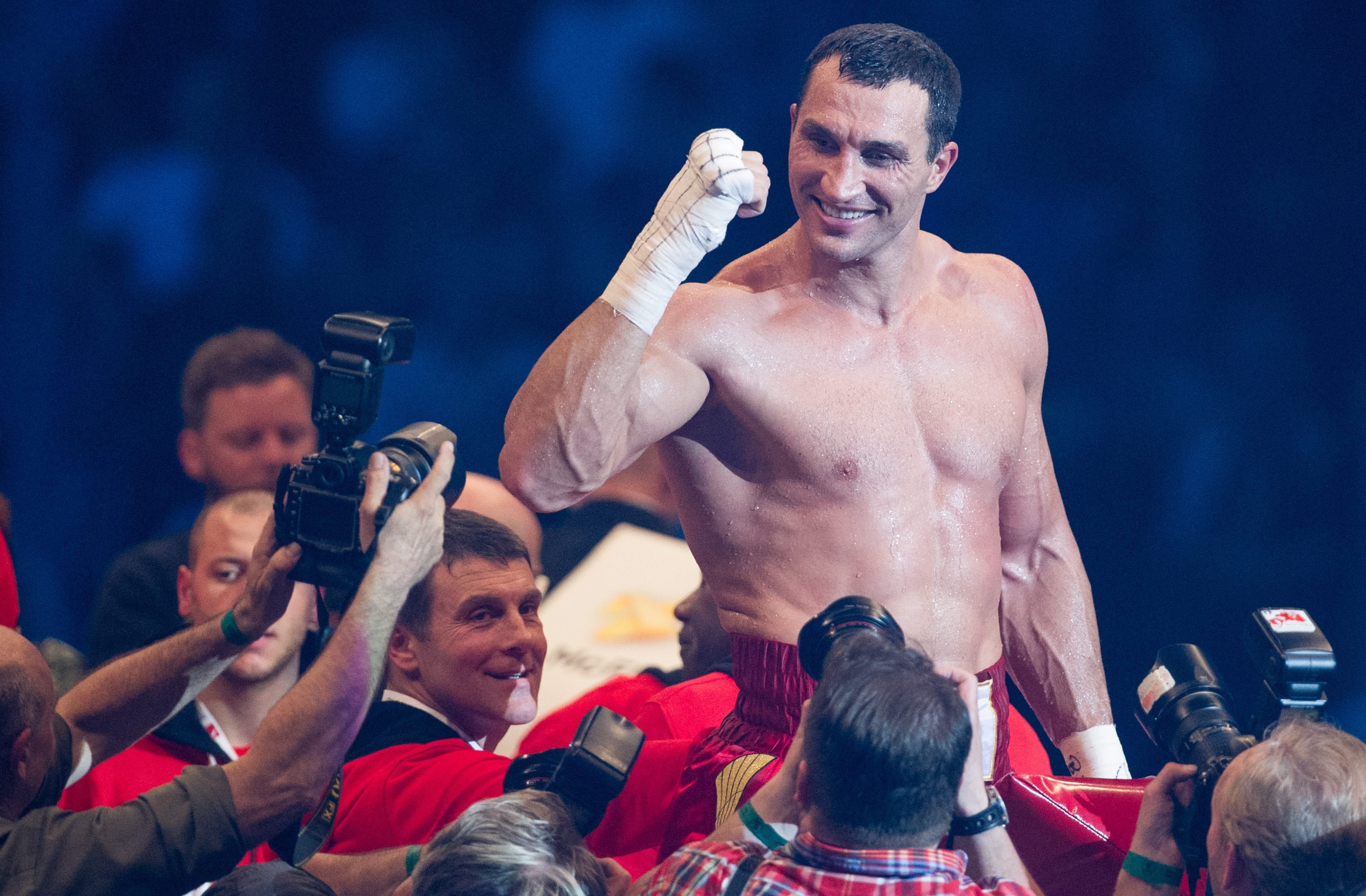 Ukrainian boxer Wladimir Klitschko celabrates his victory over German-Italian challenger Francesco Pianeta. Photo: EPA
