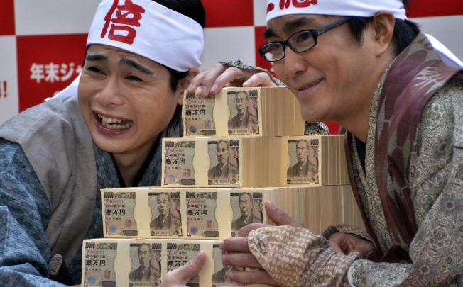 Japan is to inject US$1.2 trillion into its economy over the next two years. Photo: AFP