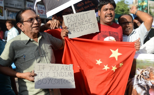 Indian citizens shout anti-Chinese slogans during a protest to boycott Chinese products in Ahmedabad. Photo: AFP
