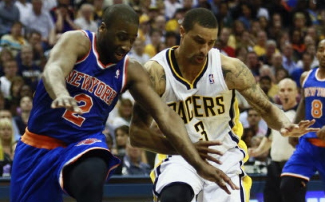 New York Knicks guard Raymond Felton (2) and Indiana Pacers guard George Hill during the second half of their NBA Eastern Conference second round playoff game in Indiana. Photo: Reuters
