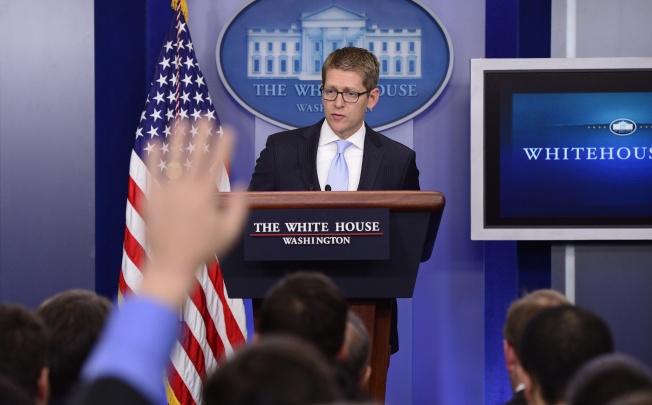 US White House press secretary Jay Carney takes questions from journalists during a press conference in Washington DC, on May 14, 2013. Photo: EPA