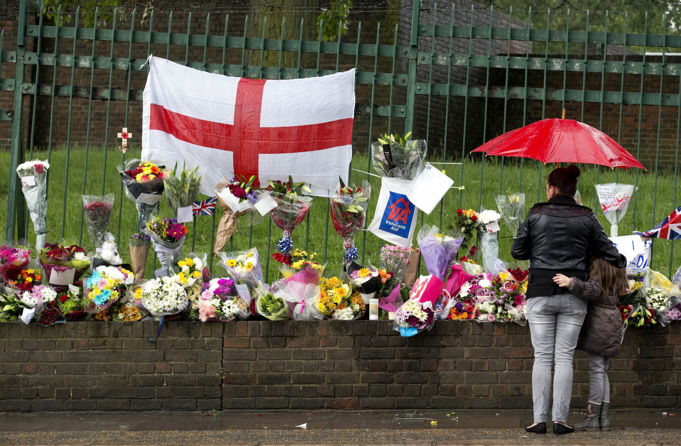 Floral tributes at the scene where Drummer Lee Rigby of the 2nd Battalion, Royal Regiment of Fusiliers, was killed outside Woolwich Barracks in London. Photo: AFP