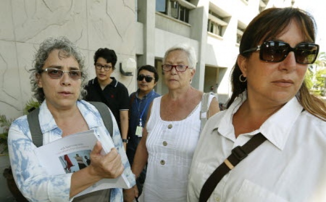 The family of Italian photographer Fabio Polenghi who was killed in the Thai capital in 2010, (left right) younger sister Elisabetta Polenghi, mother Laura Chiorri and elder sister Arianna Polenghi in Bangkok. Photo: Reuters