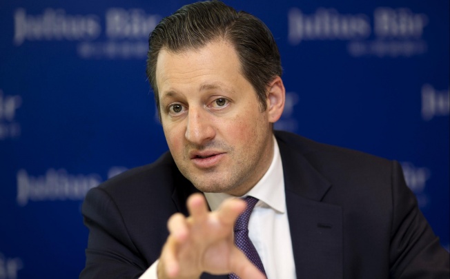Boris Collardi, the chief executive of Julius Bär, says the Swiss firm's technology hub in Asia would remain in Singapore. Photo: Bloomberg