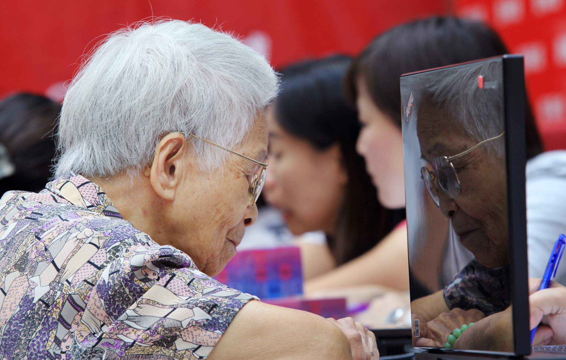 An elderly woman participates in a survey on dementia during in Hong Kong.  Around 9.19 million people in China had dementia in 2010. Photo: Edward Wong 