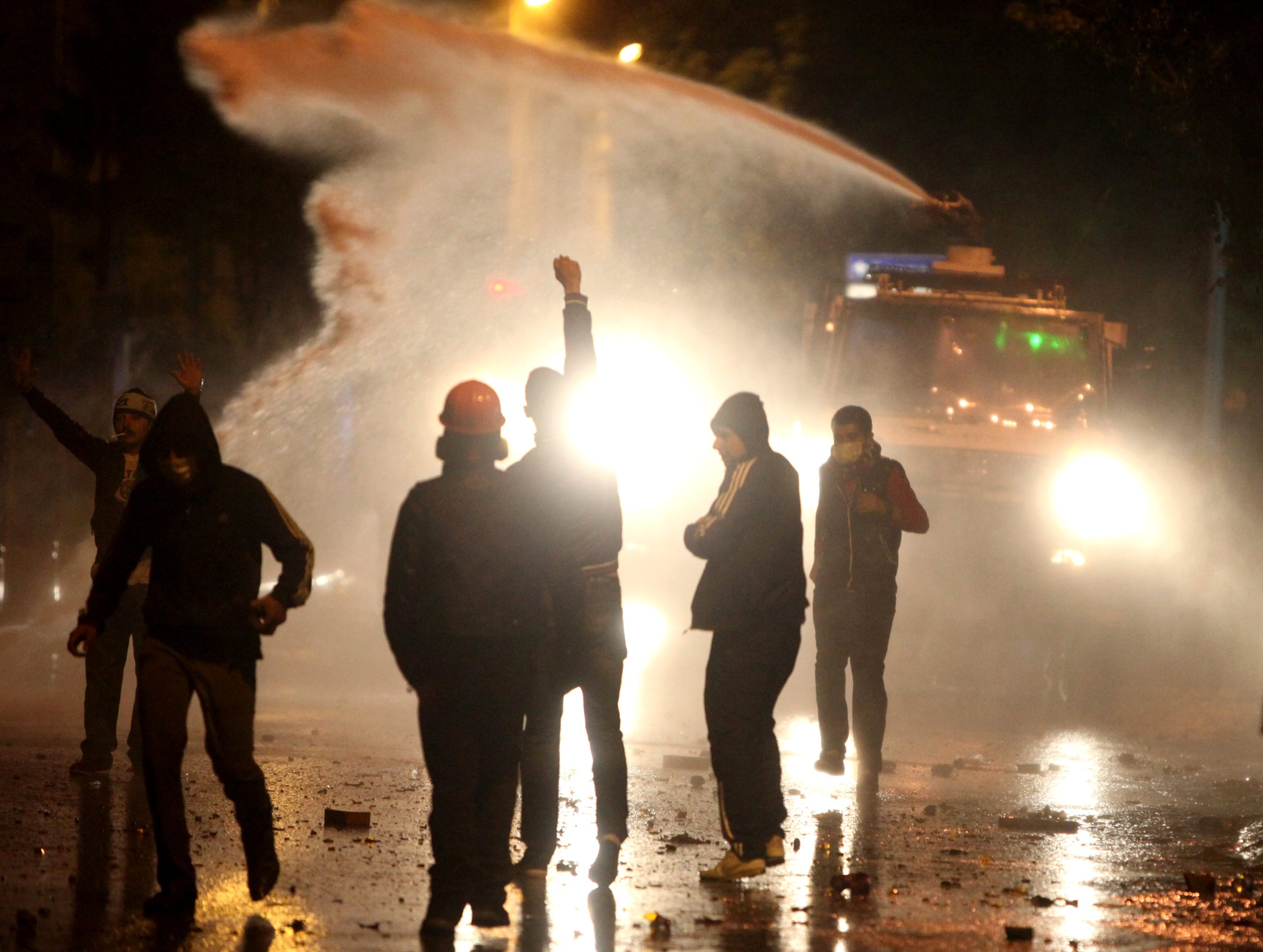 Riot police fire water cannons at anti-government protesters in central Ankara. Photo: Reuters