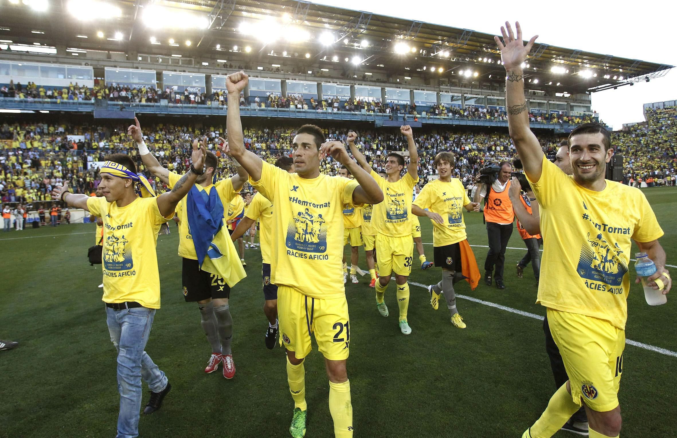 Villarreal players celebrate at El Madrigal stadium in Villarreal, eastern Spain, after their 1-0 win against Almeria on Saturday. Photo: EPA