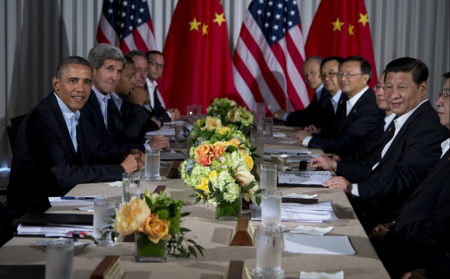 Cybersecurity issue was the top agenda during the meeting of US President Barack Obama (left) and Chinese President Xi Jinping (right) and their respective delegations at the Annenberg Retreat at Sunnylands. Photo: AP