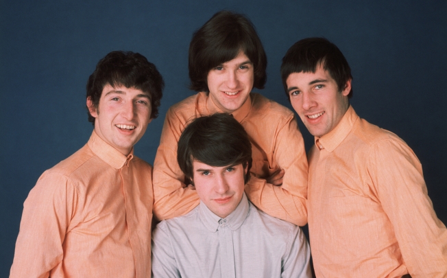 The Kinks in 1965, with Dave Davies behind his brother Ray. Photo: Hulton-Deutsch Collection/Corbis