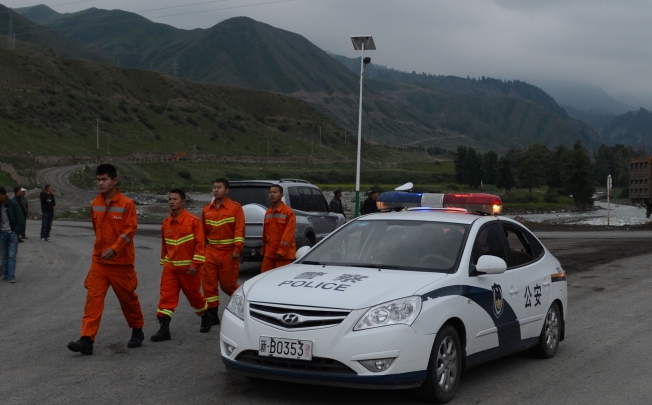 Firefighters are seen near the accident site in Changji City, northwest China's Xinjiang Uygur Autonomous Region. Photo: Xinhua