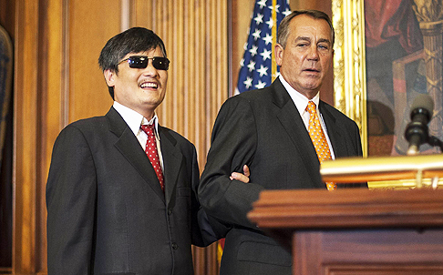 Chinese dissident activist Chen Guangcheng with US lawmaker John Boehner in 2012. Photo: AFP