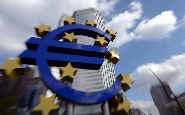 The European Commission’s latest move against 13 top investment banks could result in heavy fines. Photo: AFP