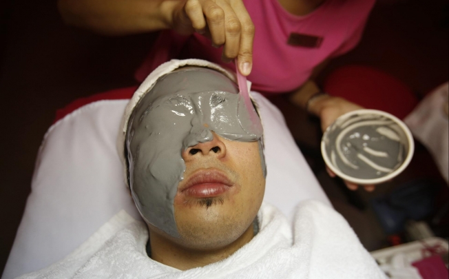 More Chinese men are getting facials. Photo: Reuters