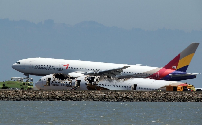The crash landing may make travellers skittish about flying Asiana in the short term, but long-term damage is not expected. Photo: AFP