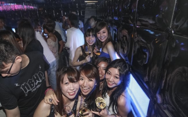 Party-goers at the Beijing Club, which, at 12,000 sq ft and on three floors, is the biggest club in the city. Photo: Beijing Club