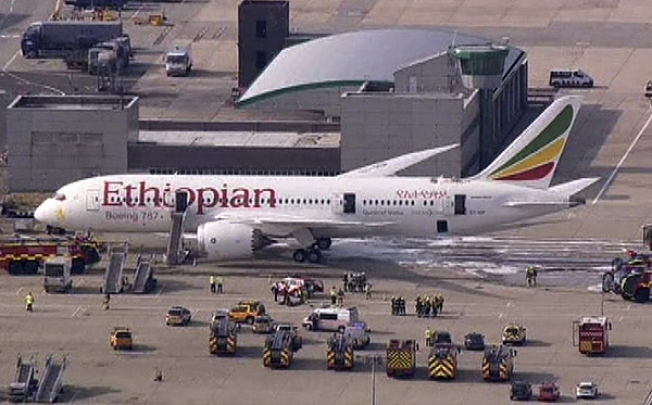 Emergency crews surround a Boeing 787 Dreamliner, operated by Ethiopian Airlines, which caught fire at Britain's Heathrow airport. Photo: Reuters
