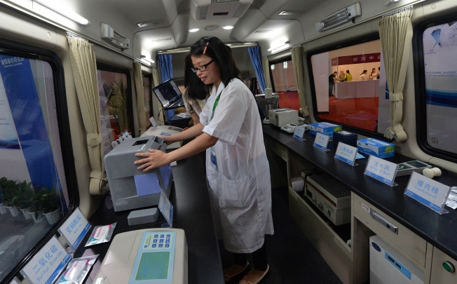 A mobile food testing vehicle shown at the China International Food Safety Technology & Innovations Expo, which will be used by Walmart to test food from their suppliers. Photo: AFP
