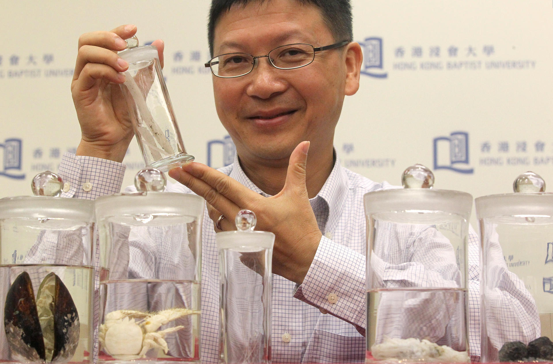 Qiu Jianwen with some of the specimens he found at the bottom of the South China Sea. Photo: K. Y. Cheng