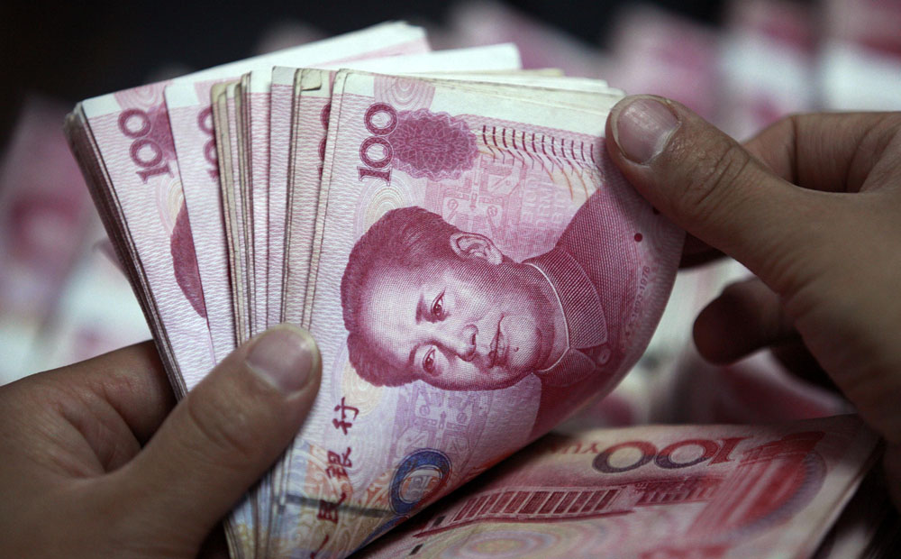 A fully convertible yuan is possible by 2020, but only if reforms can succeed. Photo: Reuters