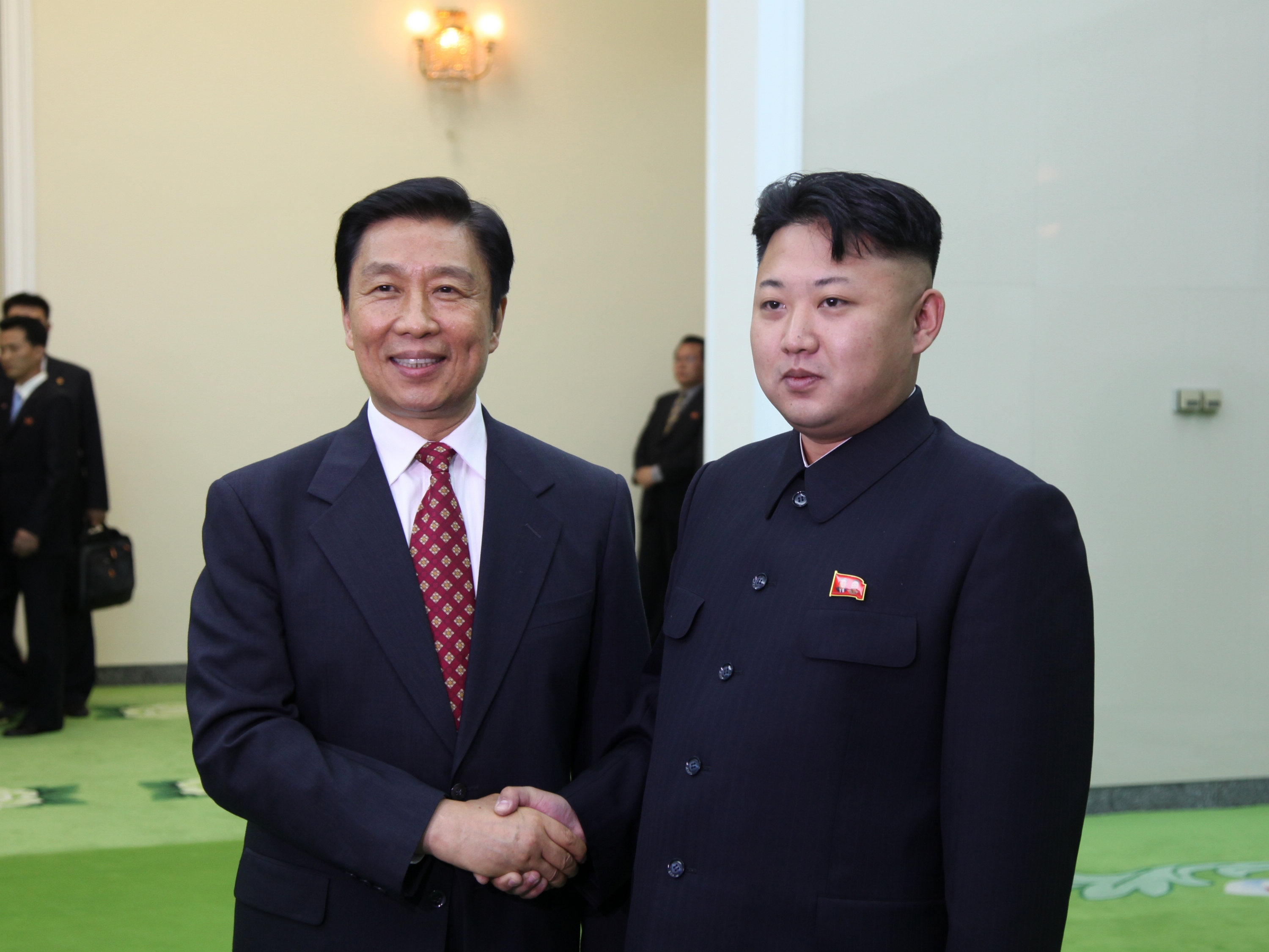 Kim Jong Un (right), top leader of the Democratic People's Republic of Korea, meets with visiting Chinese Vice President Li Yuanchao in Pyongyang. Photo: Xinhua