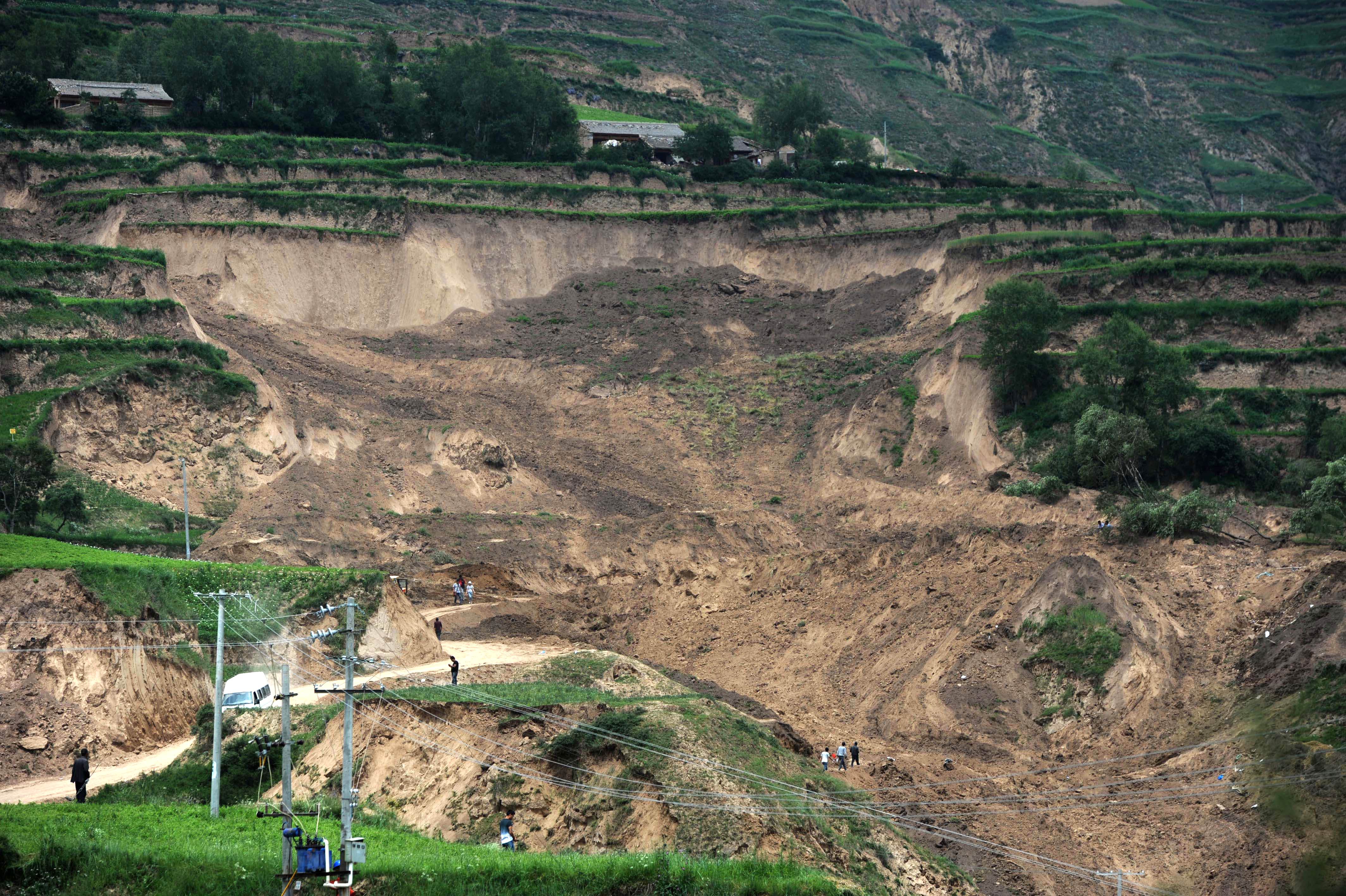 Debris left by a landslide triggered after the recent earthquakes in Minxian county in Dingxi. Photo: AFP