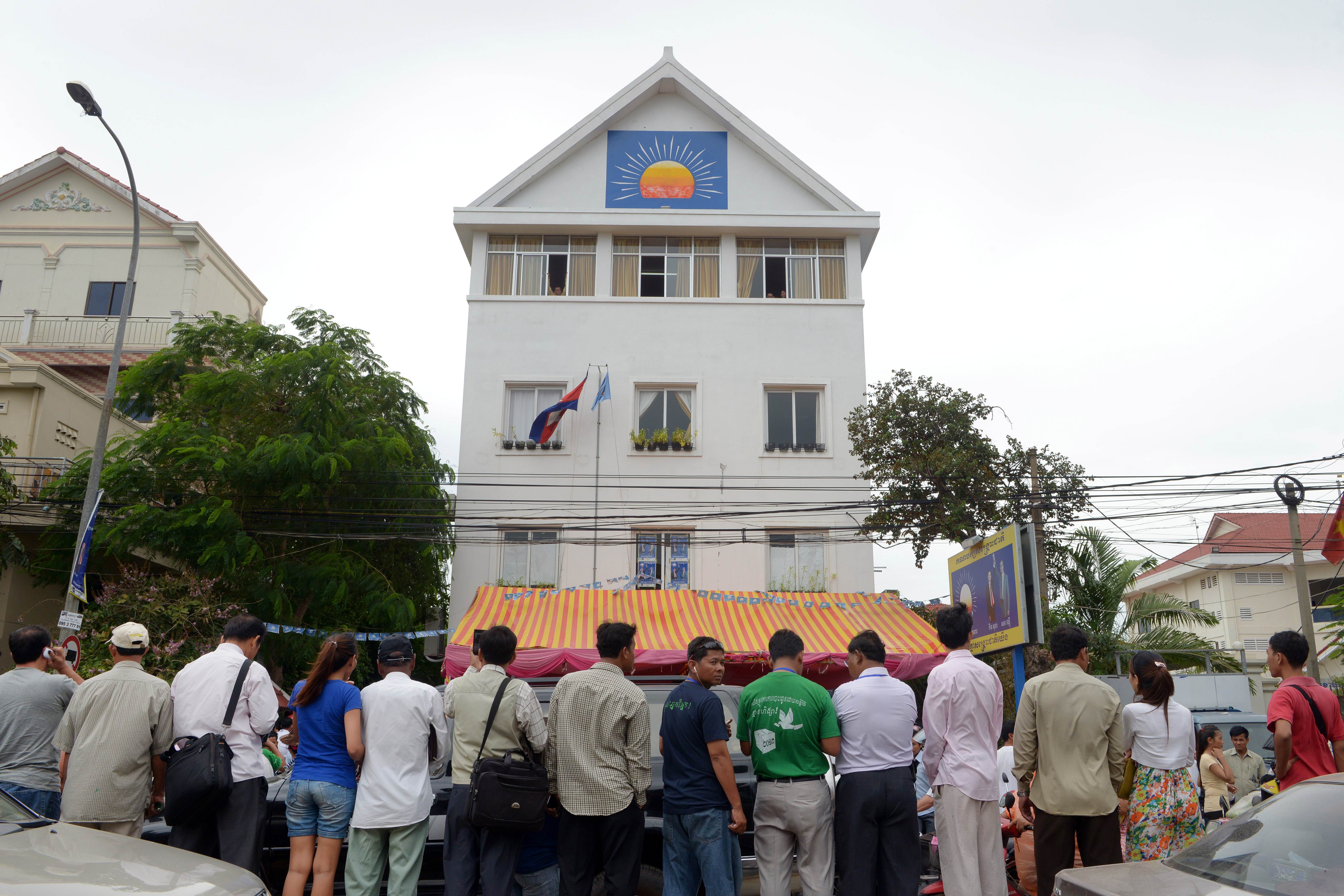 Supporters of the opposition Cambodia National Rescue Party (CNRP) gather at CNRP headquarters in Phnom Penh. Photo: AFP