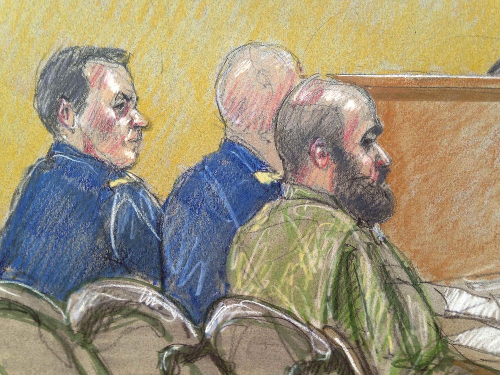 US Army Major Nidal Hasan (right), accused of killing 13 soldiers in a 2009 Fort Hood shooting rampage, is seen in a courtroom sketch during at Fort Hood in Texas. Photo: Reuters