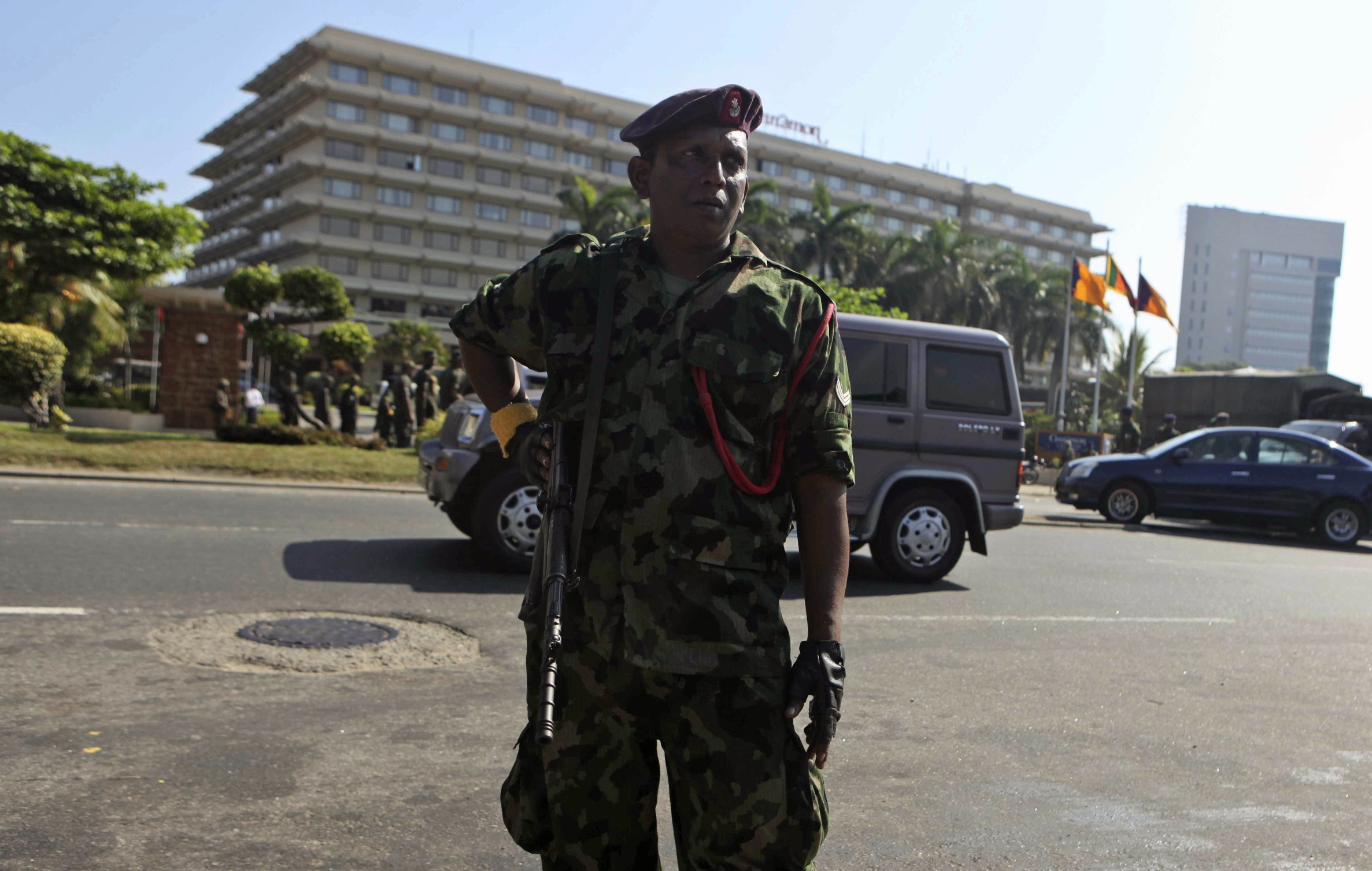 A Sri Lankan soldier in the capital city, Colombo. One person was killed and about 15 were wounded when Sri Lanka’s military fired at a protest. Photo: AP