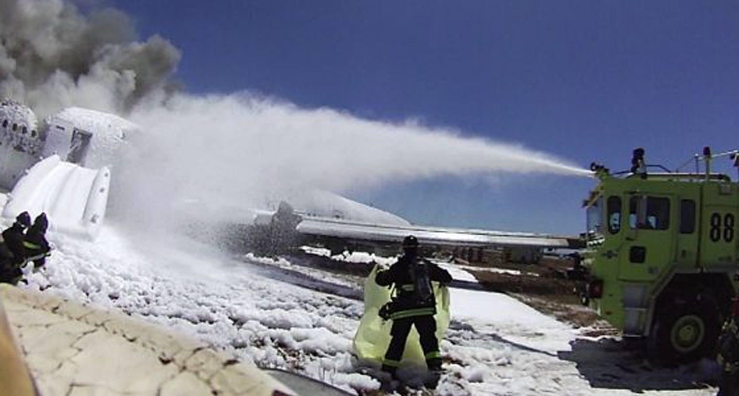 A firemen covers the body of Ye Mengyuan in an image from a helmet-mounted video camera. Photo: San Francisco Chronicle