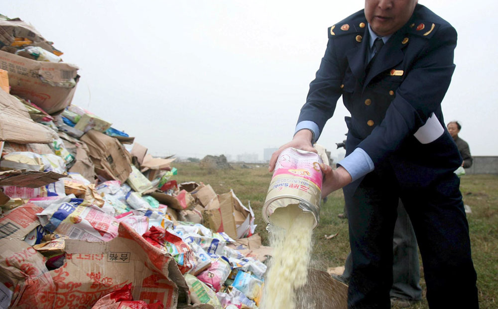 Tons of tainted melamine milk powder products have been destroyed across China in 2008. Photo: EPA