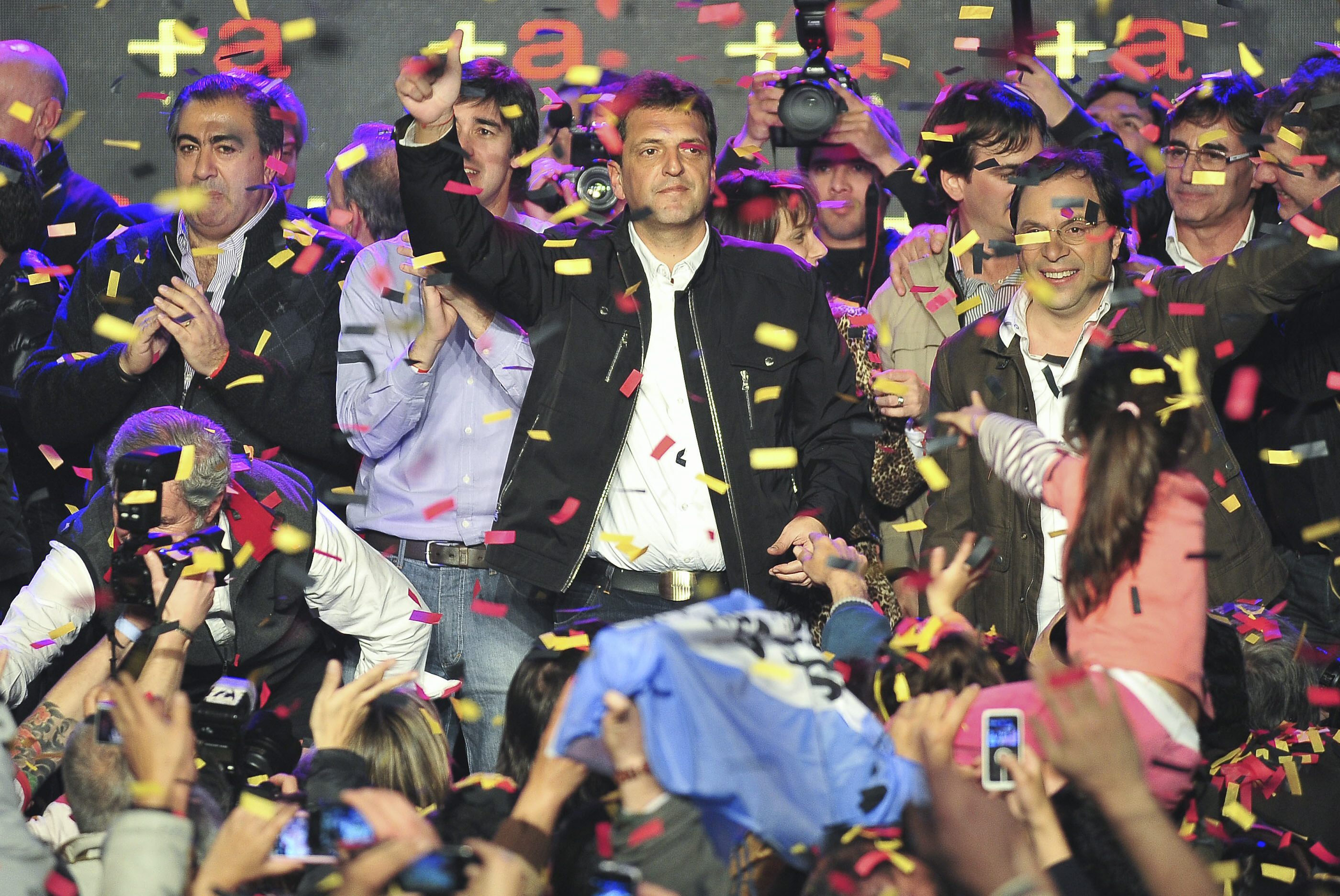 Justicialist Party opposition candidate Sergio Massa celebrates the electorate results. Photo: EPA
