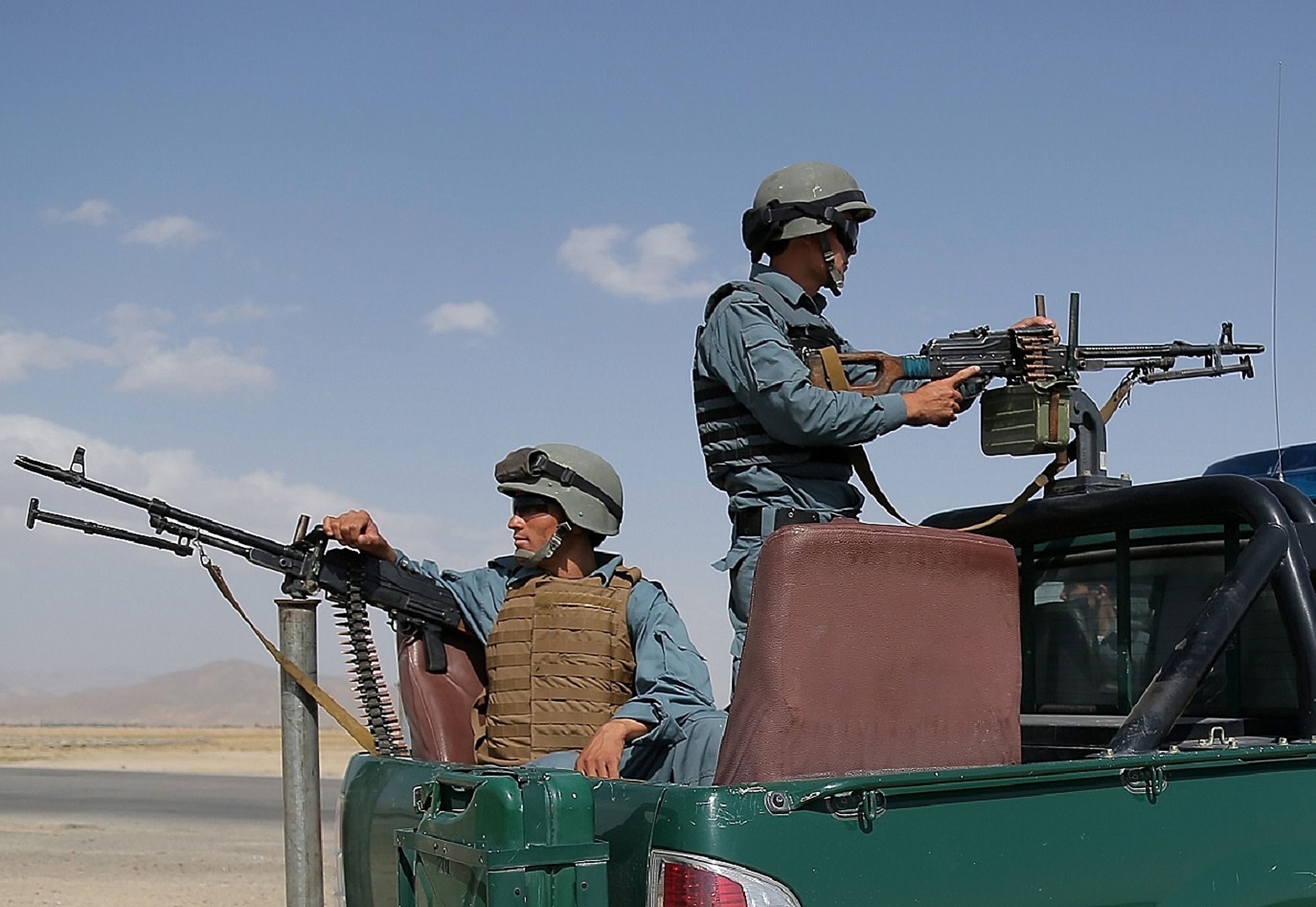 Afghan policemen keep watch at a checkpoint for Taliban militants. Insurgents killed 10 people at a construction camp in Afghanistan’s western Herat province on Saturday. Photo: AFP