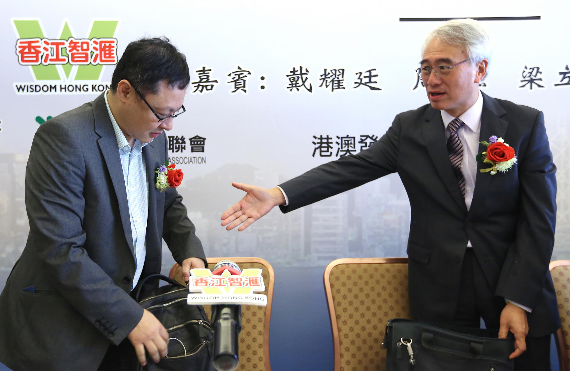 Benny Tai (left) and Robert Chow at the forum. Photo: Sam Tsang