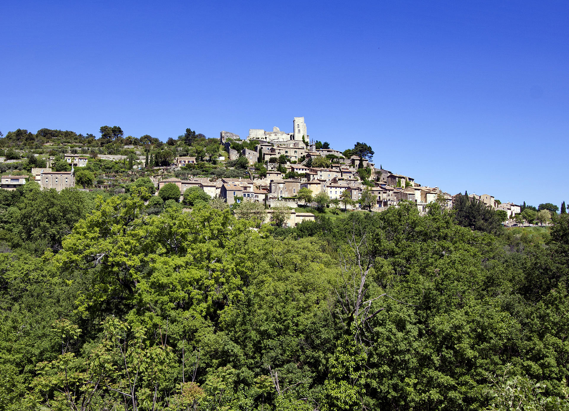 Chateau de Lacoste, former home to the Marquis de Sade, looms over the village of Lacoste.