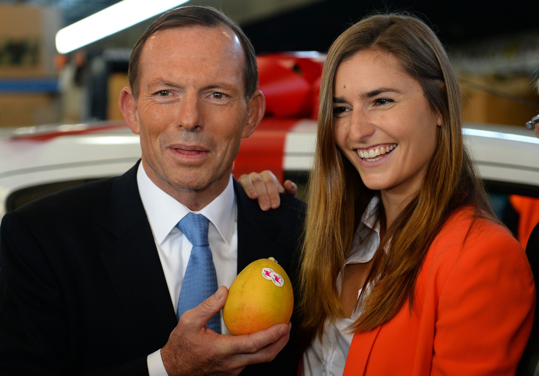 Australian opposition leader Tony Abbott campaigning with his daughter in Sydney. Photo: AFP