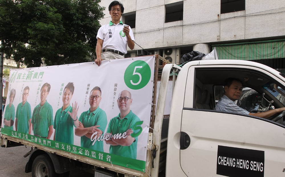 Campaign vehicles armed with loudspeakers are rolling through the streets of Macau. Photo: Edward Wong