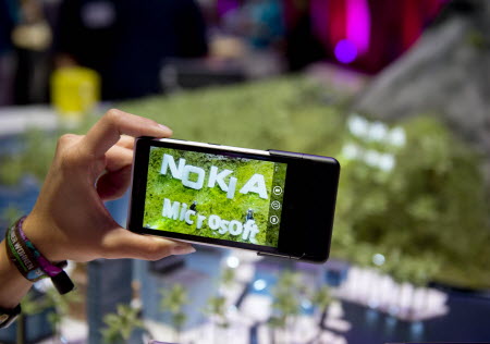 The Microsoft-Nokia marriage is too late as emerging market of mobile industry is shifting to Asia. Photo: AFP