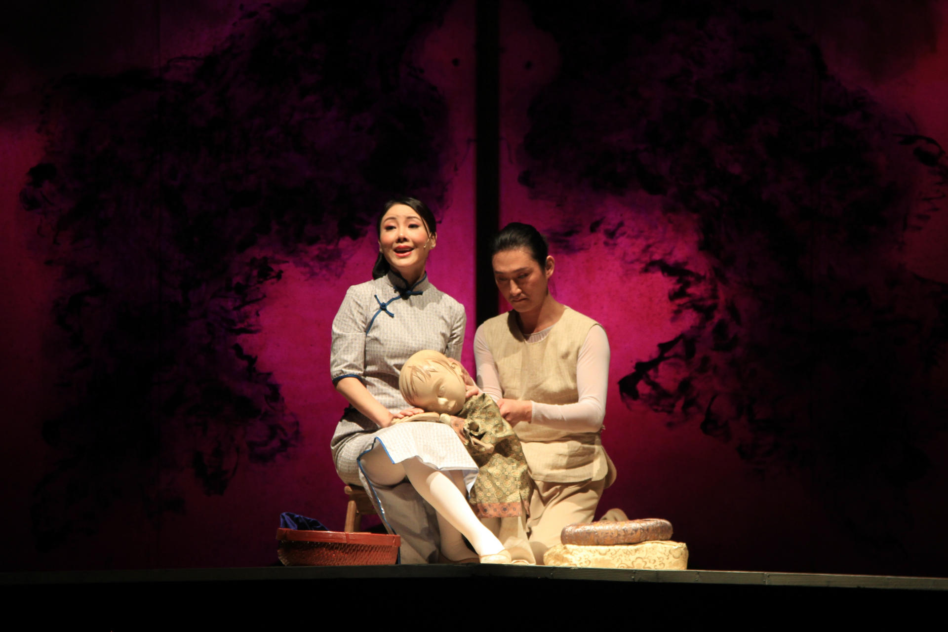 Wang Zheng, as Cho Cho, with puppeteer Han Xing 