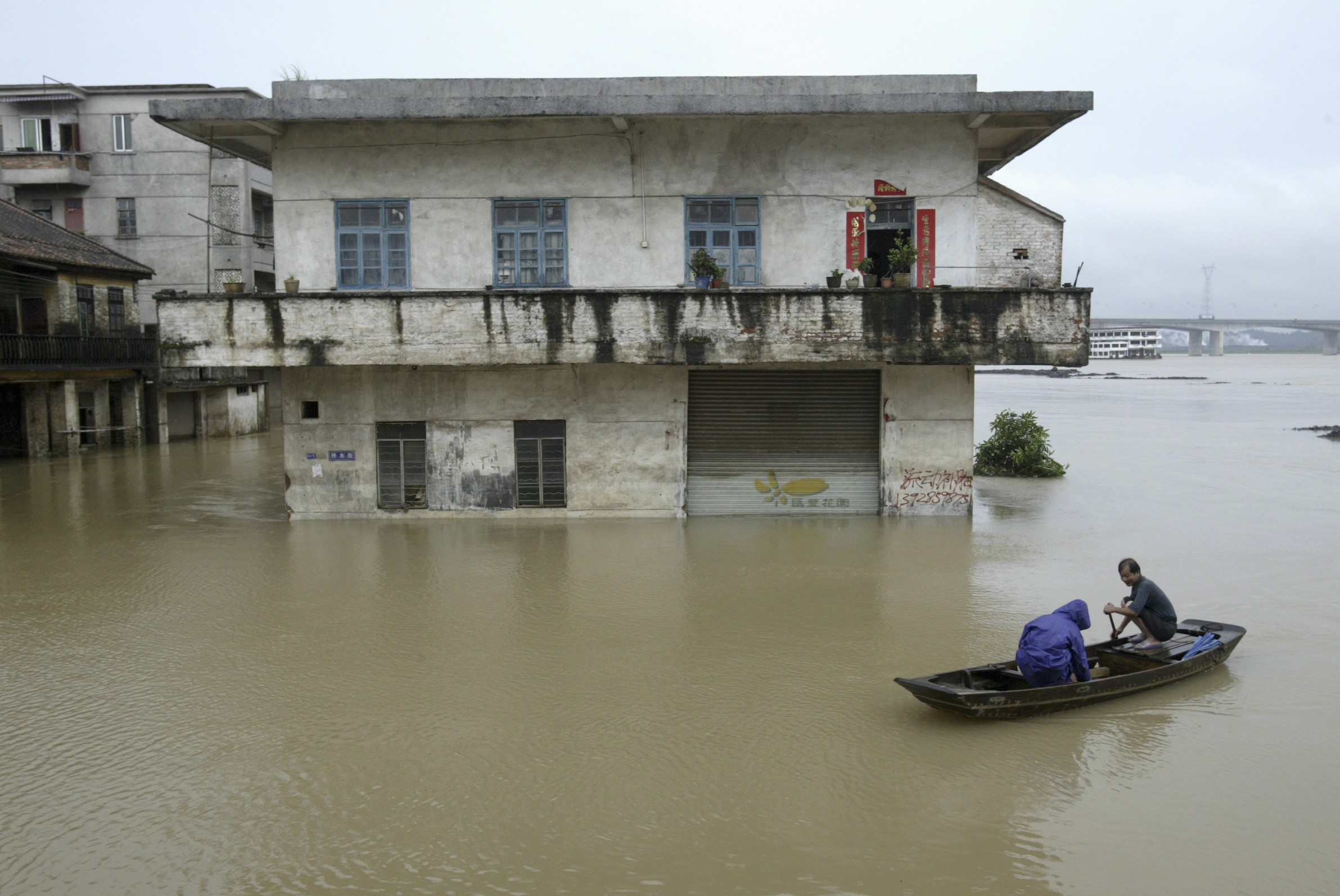 In June 2008, floods in Foshan, Guangdong province killed more than 160 people. Photo: Reuters.