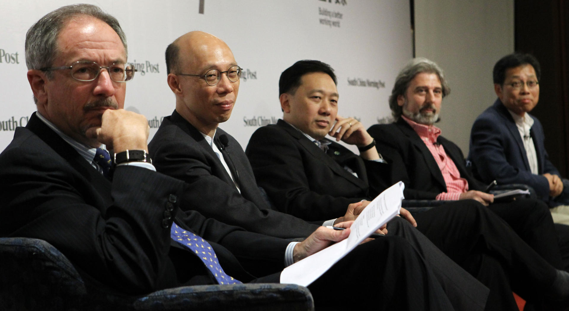 From left: Kenneth Howe, Wong Kam-sing, Conrad Wong, Paul Zimmerman and Hung Wing-tat discuss development challenges at the -hosted Redefining Hong Kong debate. Photo: Edward Wong