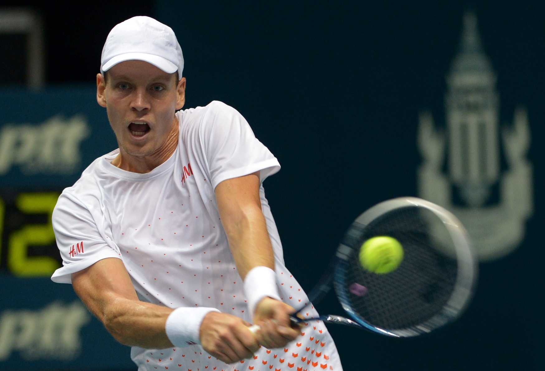 Tomas Berdych of the Czech Republic hits a return to Lu Yen-Hsun of Taiwan during the quarter final round of the ATP Thailand Open 2013 tennis tournament in Bangkok. Photo: AFP