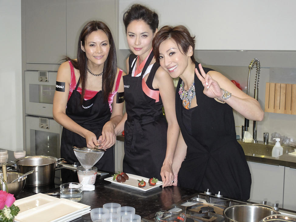 Getting set to prepare unique rose-flavoured desserts are Janet Ma, Ana Rivera and Lelia Chow. Photo: James Whittle